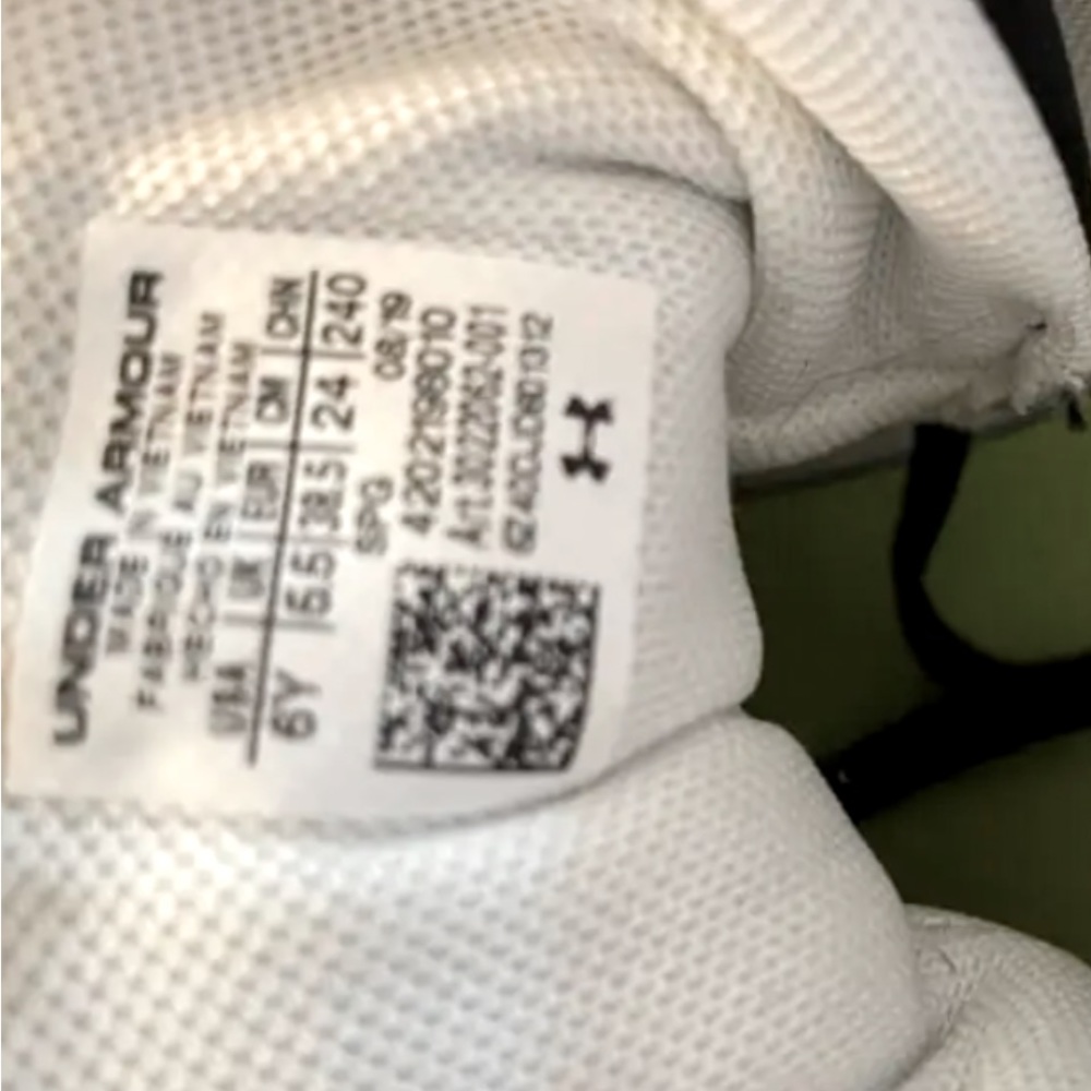 Under Armour size 6y baseball cleats. New condition with original box.